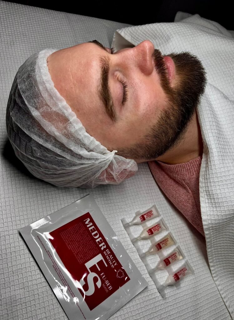 Man receiving professional facial treatment at Beauty Lounge Amsterdam